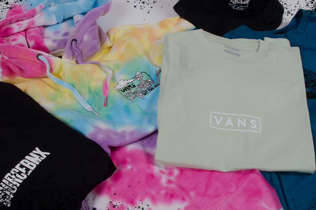 latest soft goods with tie dye hoodie, green vans top, bucket hat, blue top and source BMX black t-shirt